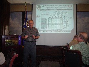 July guest speaker Jeff Huskey, Commander Navy Installations Command, speaks to the chapter about alignment issues for information technology across the Navy Shore infrastructure.